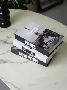 Decorative faux book set with Paris, London and New York designs for home or cafe decor.