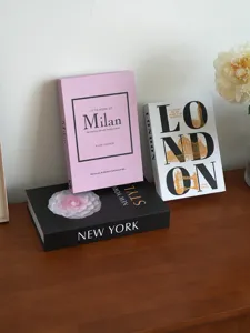 Decorative fake books set for coffee table modern home decor city theme display books.