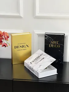 Decorative storage book boxes with luxury marble and gold designs for coffee table decor.