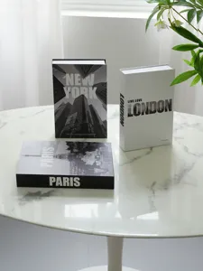 Decorative simulation book set featuring New York, London and Paris designs, ideal for home decor.