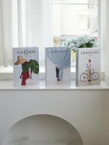 Decorative fake books set for home decor photography props, stylish minimalist design.
