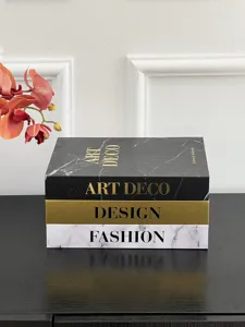 Decorative fake book storage box with luxury marble design for coffee table and desk decor.