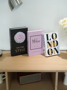 Decorative simulation books set for coffee table decor, modern city theme display prop.