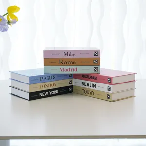 Close-up detail of colorful city decorative prop books, ideal for modern shelf styling.