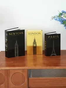 Detail view of decorative storage books set featuring New York, London, and Paris city themes.