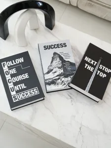 Minimalist black and white decorative books, modern motivational quote office coffee table decor.
