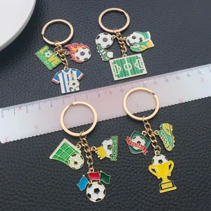 Creative metal dripping oil football keychain set with trophy and jersey charms, sport gift.