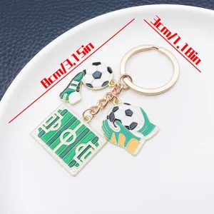 Close-up detail shot of the creative soccer theme metal keychain with cute charms and details.