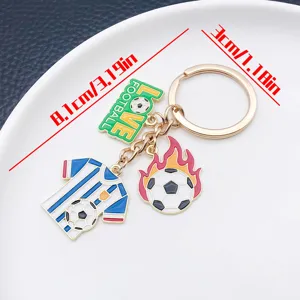 Creative metal oil-drop football keychain with jersey and flame soccer charms for fans.