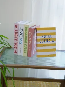 Decorative fake books for home decor, modern aesthetic book stack for coffee table display.