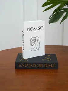 Decorative fake book set with Picasso and Dali art linen texture for modern home decor.