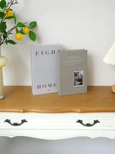 Decorative fake book set for modern home interior styling, elegant shelf and desktop decor.