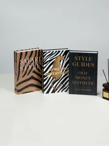 Luxury decorative books set for coffee table, elegant faux book props for modern home decor.