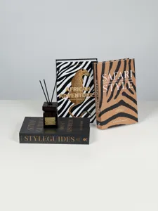 Decorative fake books set detail showcasing luxury animal print covers and elegant home decor.