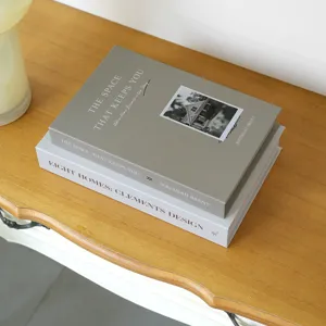 Modern decorative fake book model for coffee table, aesthetic home study room display.