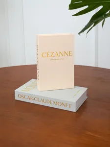 Scatola libro decorativa con trama in lino e stampa a caldo dorata per tavolino da caffè.