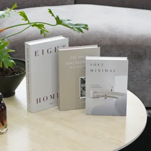 Minimalist decorative fake book set for interior design and home staging display boxes.