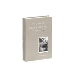Decorative fake book for interior design, modern grey bookshelf display prop and room decor.