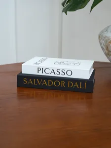 Scatola libro finta decorativa con struttura in lino e design artistico Picasso e Dali.