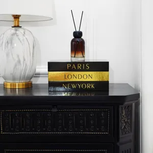 Luxury decorative book box with gold foil city print for modern home decor and storage.