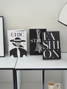 Minimalist black and white fashion decorative storage book detail, modern faux book box.