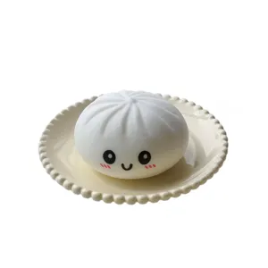 Jouet squishy mignon en forme de boulette souriante pour soulager le stress au quotidien
