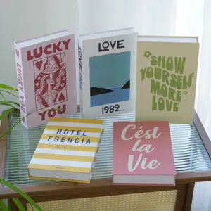 Modern cream style decorative fake books set for living room tabletop and photography props.