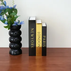 Decorative fake book storage box set for home decor, modern luxury style display book ornament.