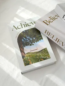 Decorative simulation book detail shot, minimalist modern style soft furnishing tabletop ornament.