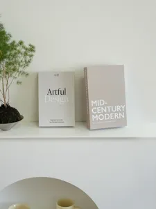 Modern decorative fake book set with elegant English typography for coffee table home decor display.
