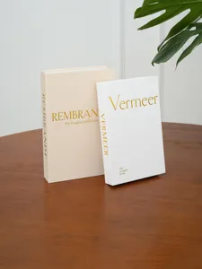 Decorative vintage book boxes with linen texture, ideal for coffee table and home decor.