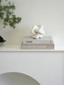 Minimalist English decorative fake book set for home and coffee table display detail.
