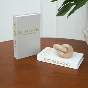 Decorative fake books set with linen texture and gold foil stamping for coffee table decor.