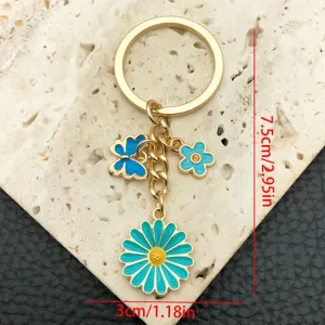 Portachiavi margherita smaltato simpatico farfalla blu ciondolo borsa accessorio metallo.