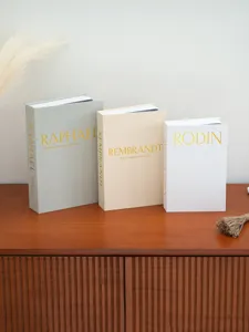 Minimalist linen texture decorative fake book storage box set for desktop organization.
