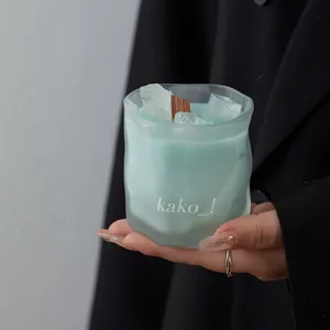 Frosted glass crystal scented candle detail view, unique fragrance candle with wooden wick.
