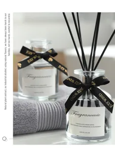Reed diffuser set with glass bottle and black sticks for elegant home fragrance and air freshening.