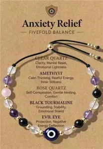 Adjustable crystal healing beaded bracelet with evil eye charm on packaging card
