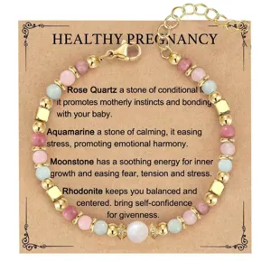 Detail view of healing crystal beaded pregnancy bracelet on descriptive gift card