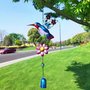 Metal hummingbird wind chime hanging decor with glass wings and flowers for outdoor garden.