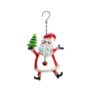 Detailed close-up shot of the painted iron Christmas Santa Claus hanging ornament features vivid colors.