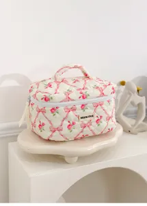 Quilted makeup bag with cute pink ribbon and rose pattern, portable cosmetic storage bag.