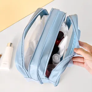 Grosse Kapazitaet doppelschichtige wasserdichte blaue Kosmetiktasche fuer Reise.