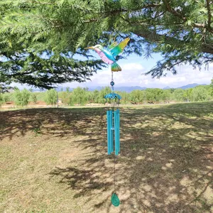 Metal hummingbird wind chime hanging outdoor garden decor detail view craftsmanship ornament showcase
