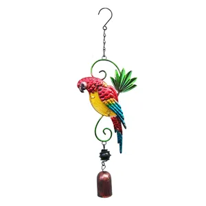 Metal parrot wind chime detail showing vibrant red bird sculpture with hanging bell and hook.