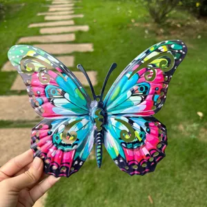 Colorful metal butterfly wall art detail, vibrant painted cutout garden decor hanging.