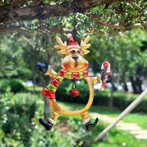 Christmas iron art hanging reindeer ornament with bell, festive holiday garden decor item.