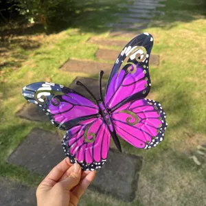 Colorful metal butterfly wall art, decorative iron butterfly hanging for home and garden decor.