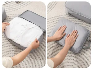 Waterproof travel storage bag for luggage clothes organization, durable grey packing cubes.