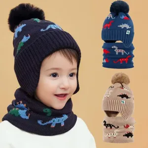 Kids winter knitted dinosaur hat and neck warmer set with cute pom-pom and fleece lining.